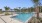 private resident pool with sun shelf and loungers